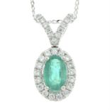 An 18ct gold emerald and diamond pendant, with chain.