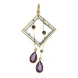 An early 20th century 9ct gold enamel, amethyst and split pearl pendant.