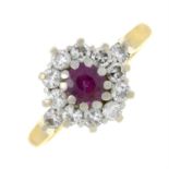 An 18ct gold ruby and diamond cluster ring.