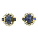 A pair of sapphire cabochon, square-cut sapphire and diamond stud earrings.