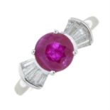 An 18ct white gold ruby and diamond ring.
