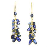 A pair of sapphire drop earrings.