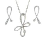 A 9ct gold brilliant-cut diamond twist knot pendant and earrings set.