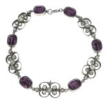 An early 20th century purple and colourless paste bracelet.