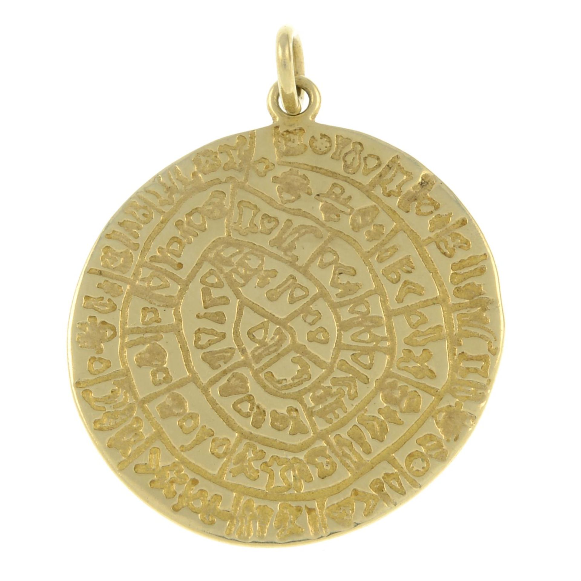 A pendant, depicting 'Phaistos Disc'.