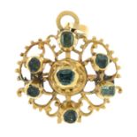 An early 19th century gold, foil-backed emerald pendant.