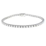 A brilliant-cut diamond line bracelet.