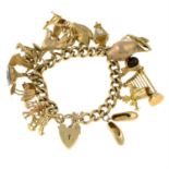 A 9ct gold charm bracelet, suspending sixteen charms.