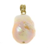 A baroque pearl pendant.