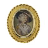 A diamond and ruby portrait miniature brooch.