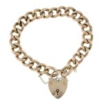 A curb-link bracelet, gathered at a heart-shape padlock clasp.