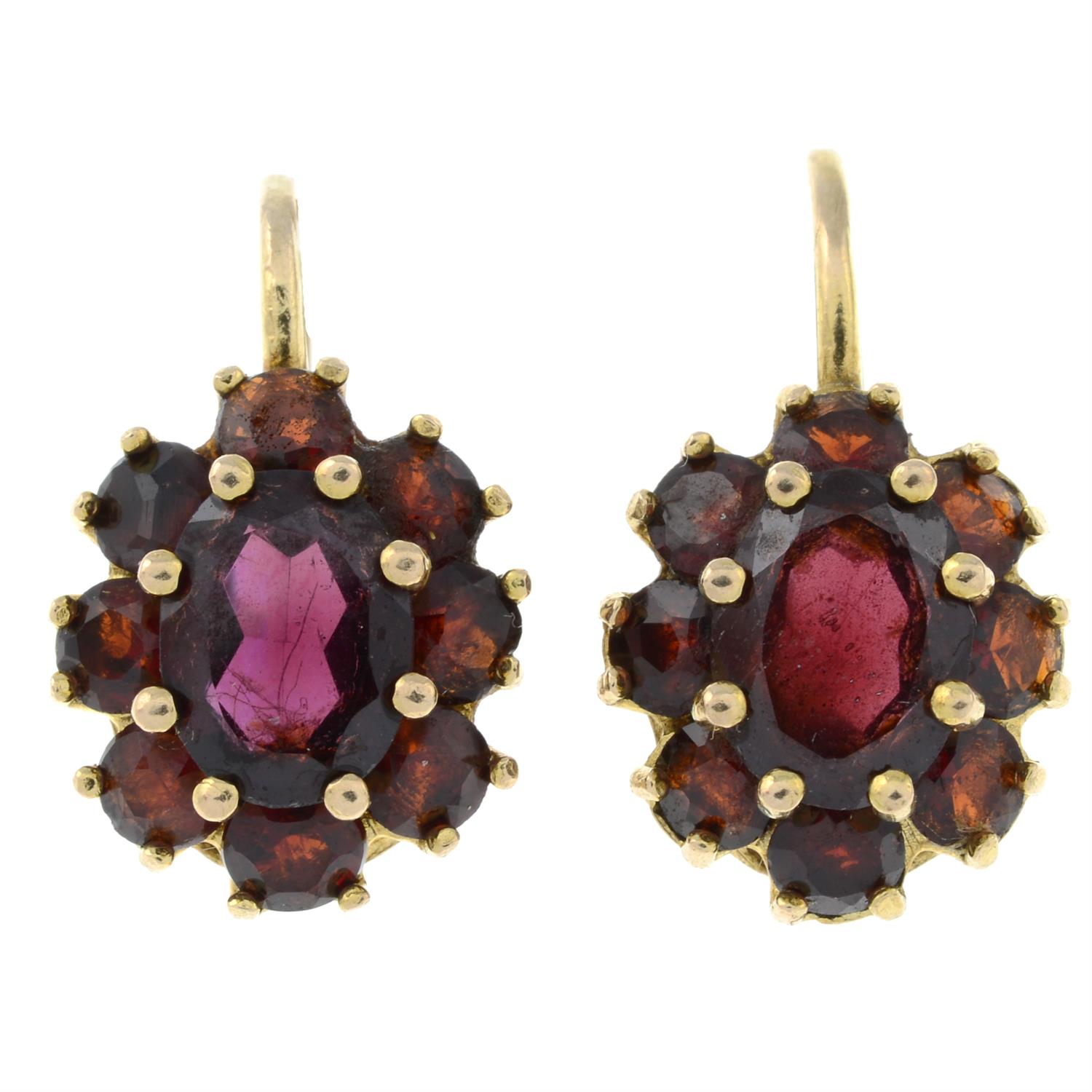 A pair of garnet cluster earrings.