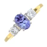 An 18ct gold tanzanite and diamond three-stone ring.