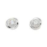 A pair of 9ct gold brilliant-cut diamond stud earrings.