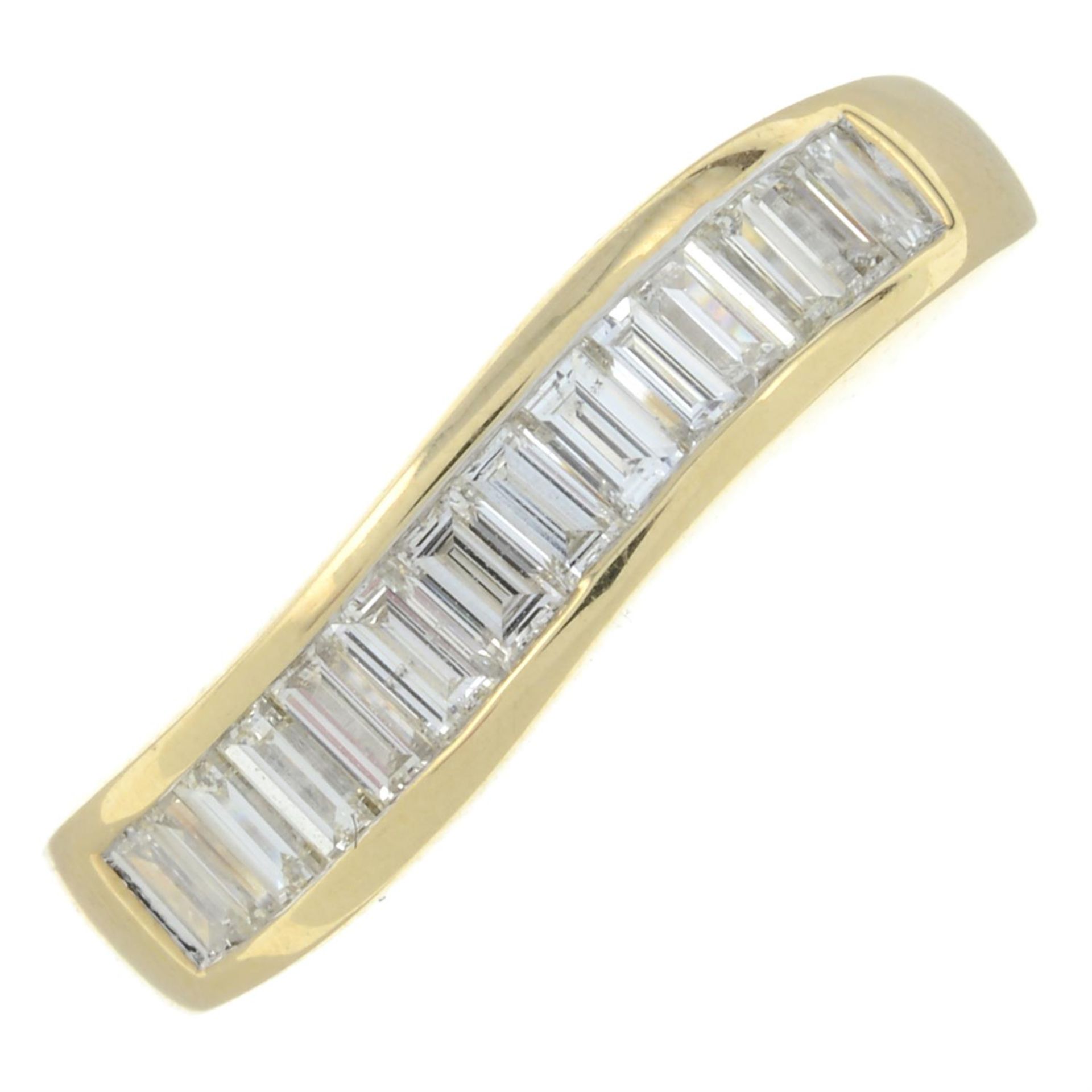 A 14ct gold baguette-cut diamond half eternity ring.