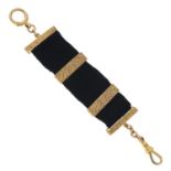 An early 20th century Moire watch fob.