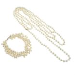 A multi-strand cultured pearl necklace, together with a matching bracelet.