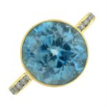 An 18ct gold blue zircon and diamond ring.