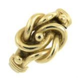 A 9ct gold knot ring.