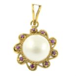 A mabe pearl and ruby cluster pendant.