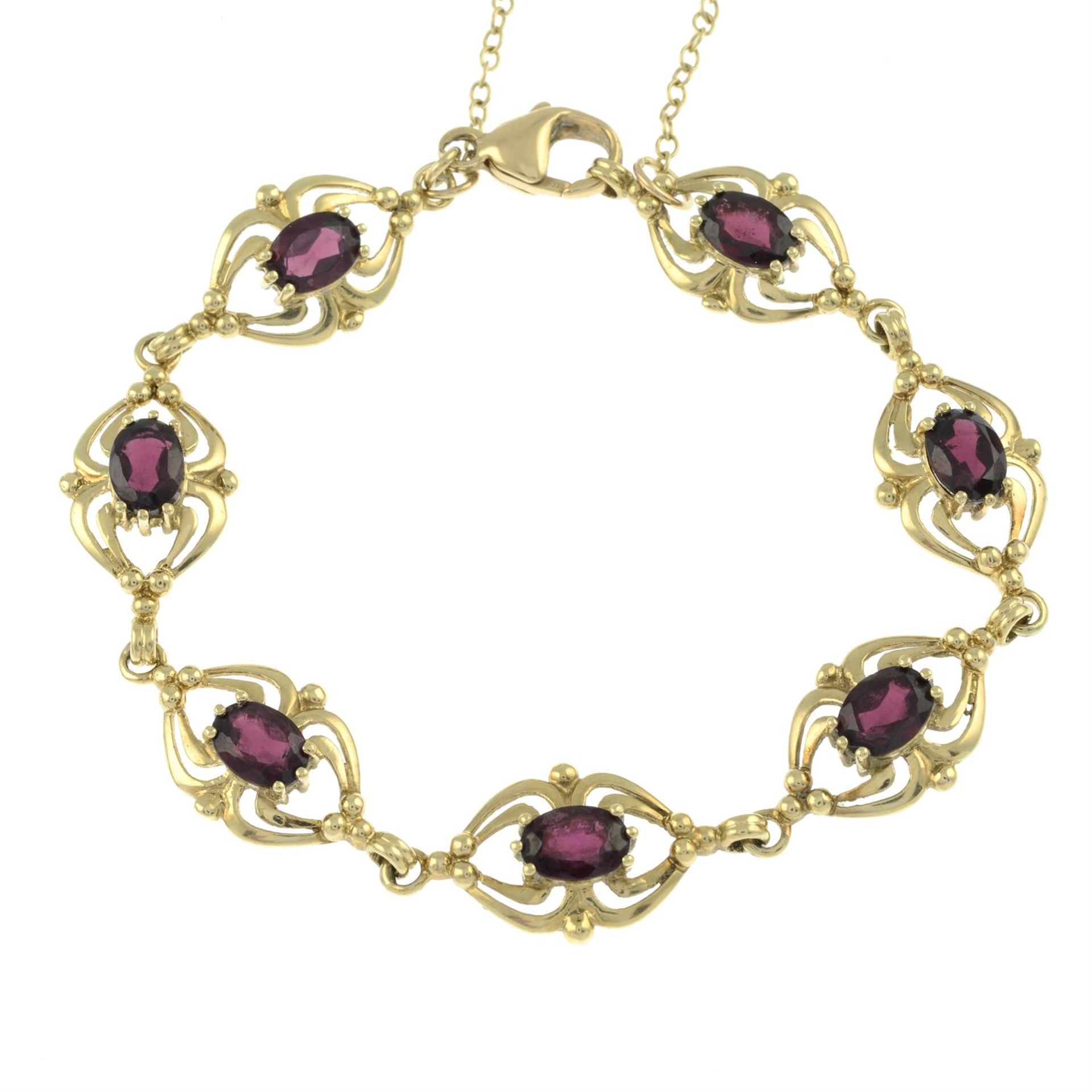 A 9ct gold garnet bracelet.