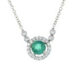 An emerald and brilliant-cut diamond cluster pendant, with integral chain.