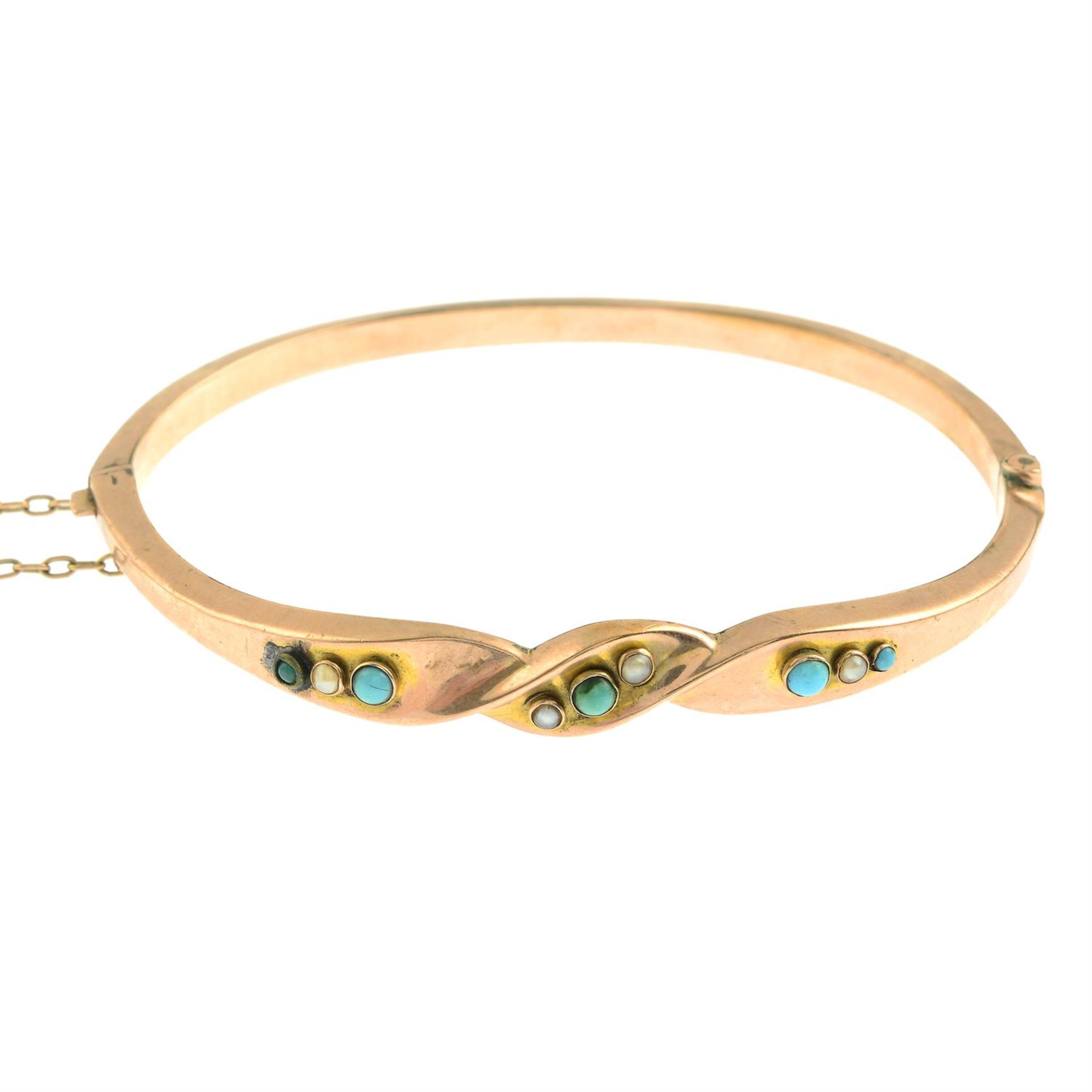 A late Victorian 9ct gold, turquoise and split pearl hinged bangle.