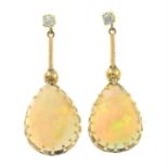 A pair of opal and diamond drop earrings.