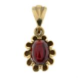 A 9ct gold garnet single-stone pendant.