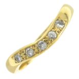 An 18ct gold brilliant-cut diamond band ring.