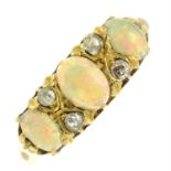 An early 20th century 18ct gold opal cabochon and old-cut diamond ring.