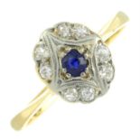 A single-cut diamond and sapphire cluster ring.
