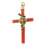 A mid 19th century coral cross pendant, with furling snake detail.
