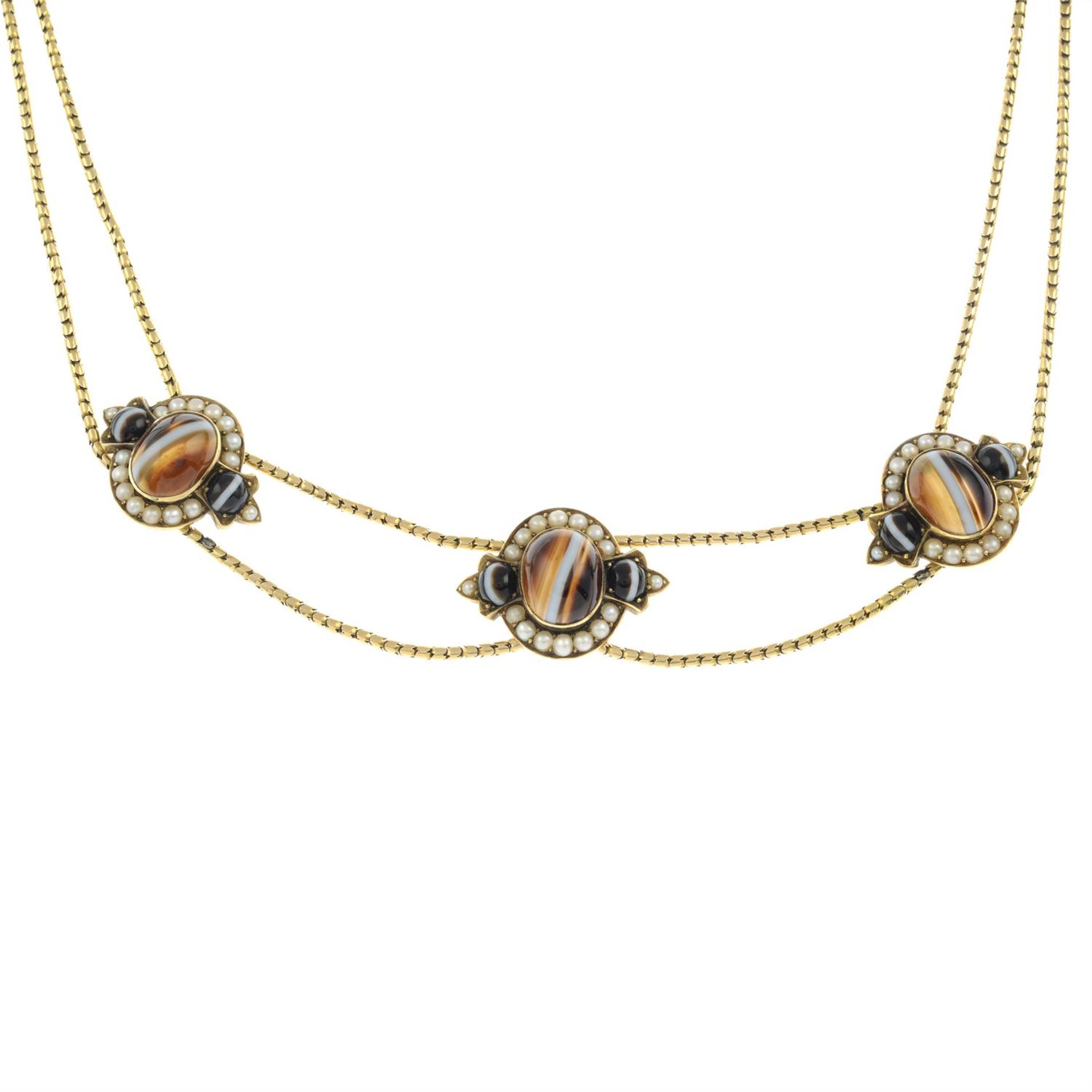 A late Victorian gold banded agate and split pearl necklace.