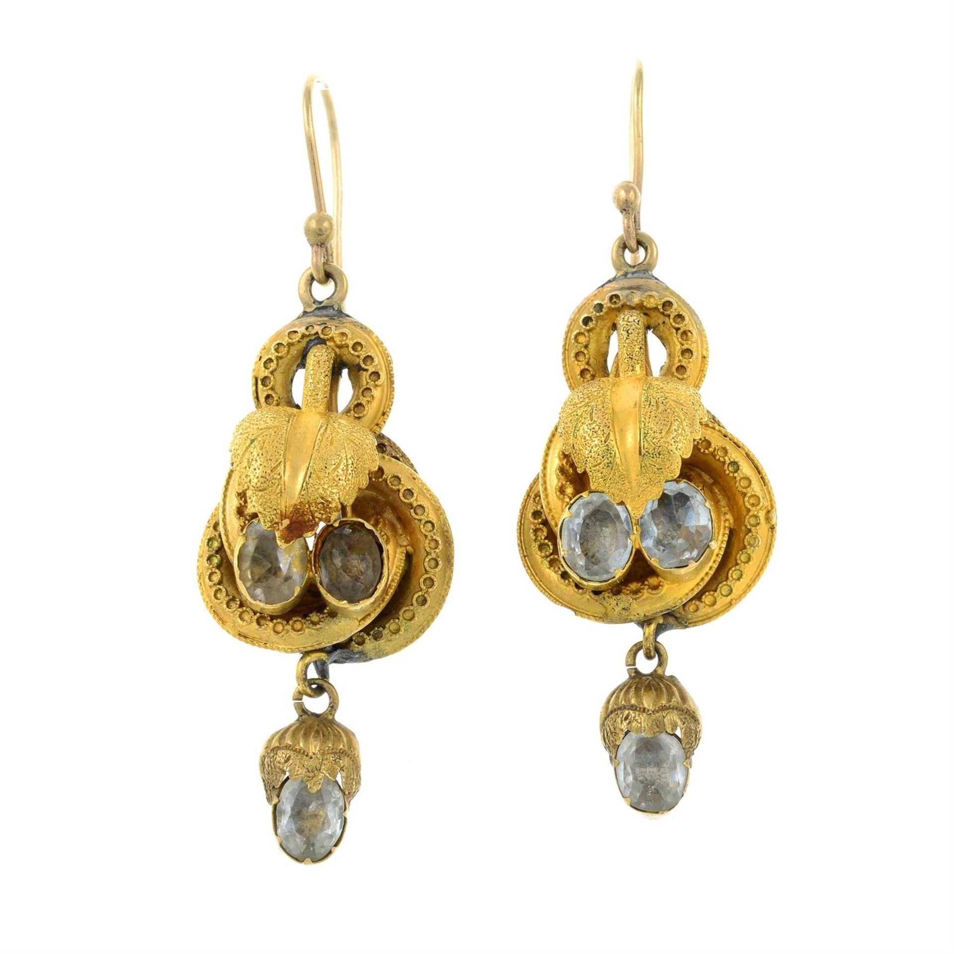 A pair of late 19th century gold, blue-gem foliate scroll earrings.