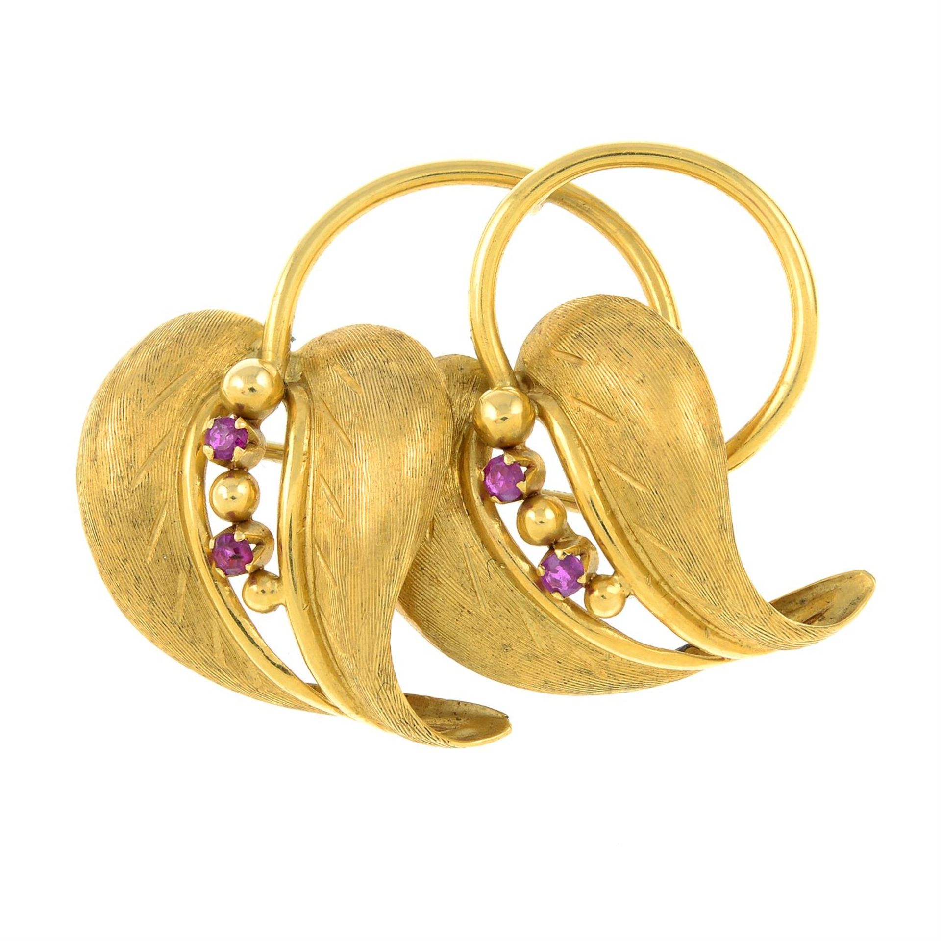 A 1960s 18ct gold ruby double leaf brooch.