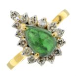 A tsavorite garnet and diamond cluster ring.