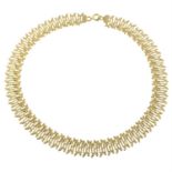 A 1970s 9ct gold textured fancy-link necklace.