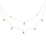 An 18ct gold emerald and brilliant-cut diamond collet two-row necklace.