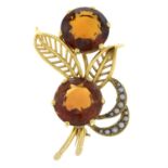 A mid 20th century 18ct gold citrine and split pearl floral spray brooch.