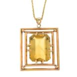 A citrine openwork pendant, with chain.