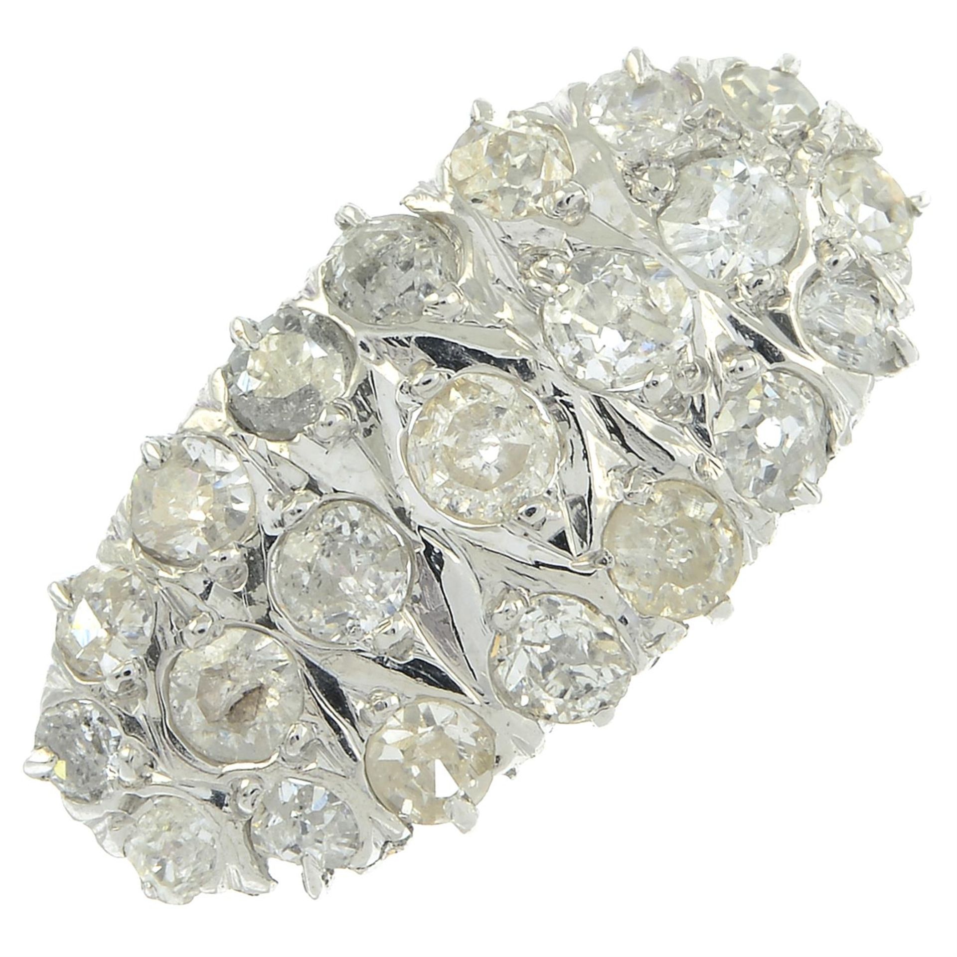 An old-cut diamond marquise-shape cluster ring.