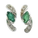 A pair of emerald and brilliant-cut diamond stud earrings.