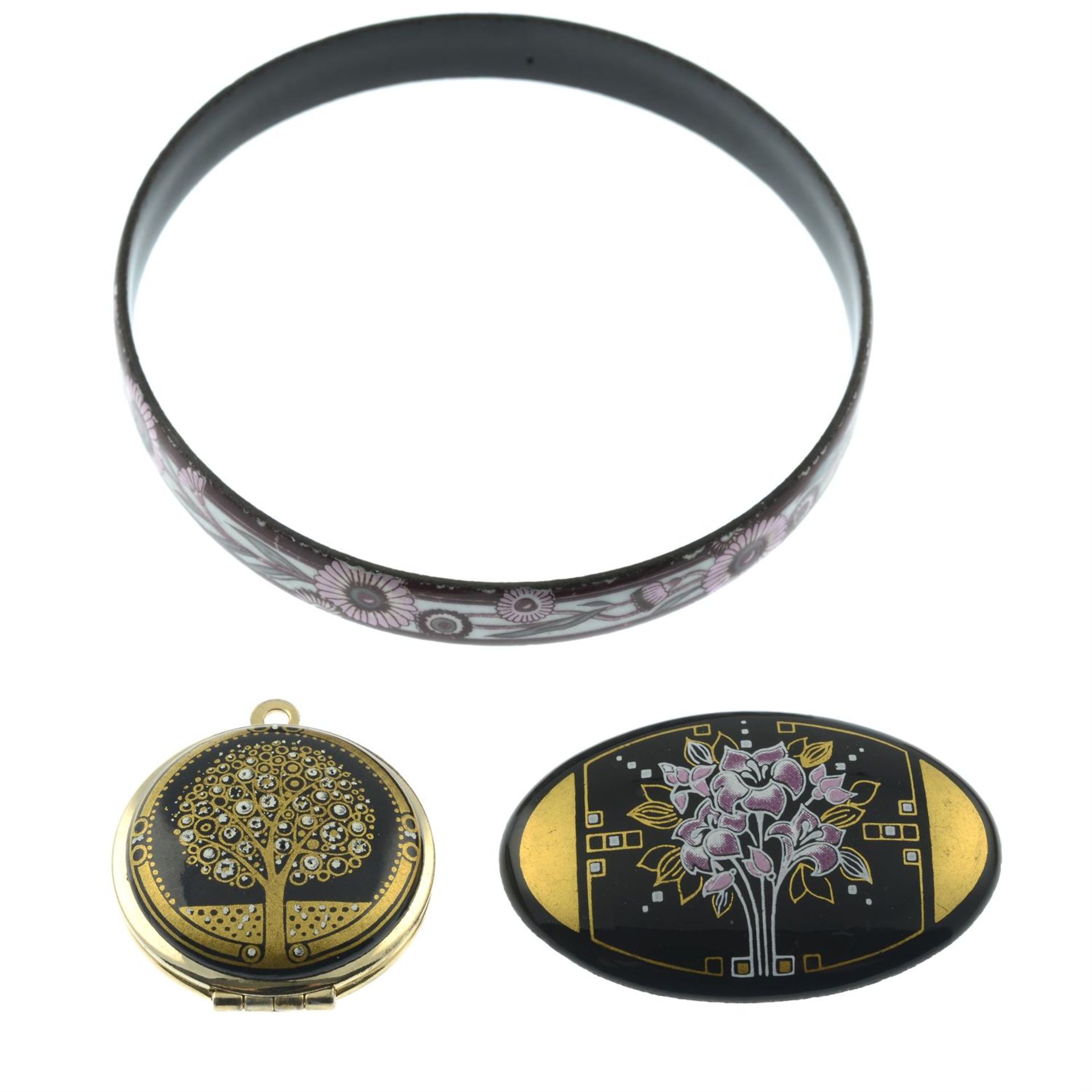 Three items of enamel jewellery, to include a locket, bangle and a brooch by, Michaela Frey.