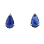 A pair of 18ct gold sapphire cabochon single-stone stud earrings.