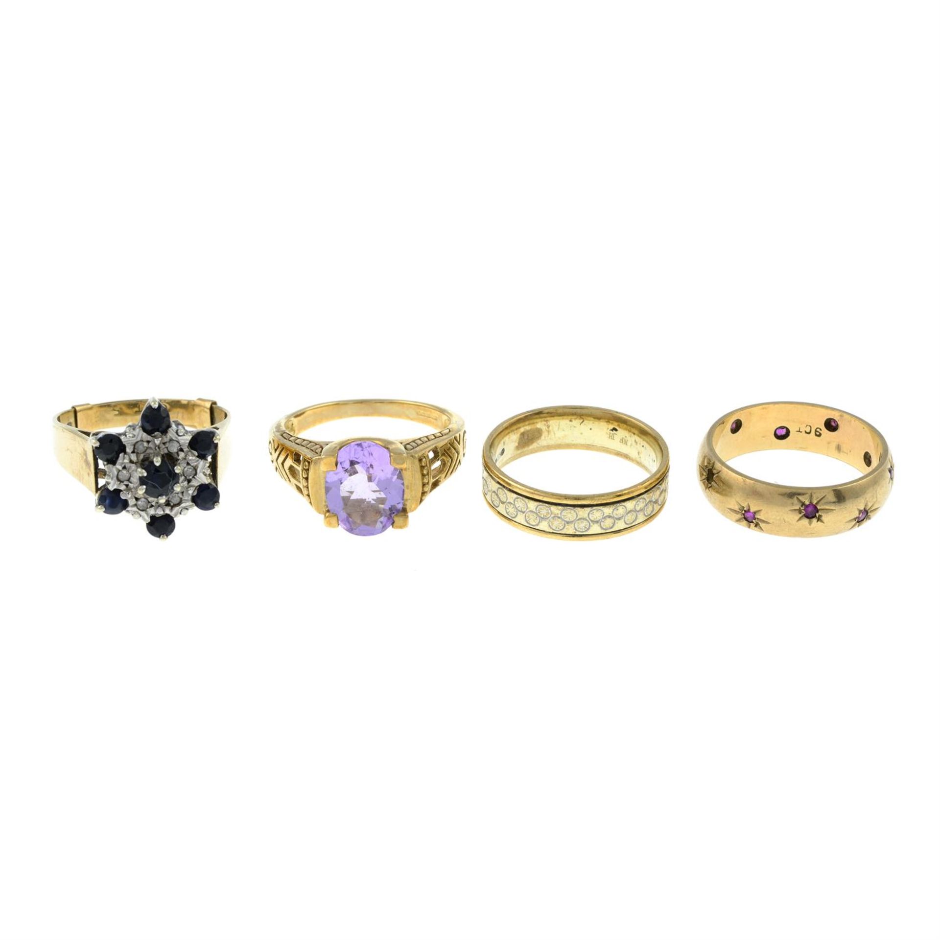 Three gem-set rings and a band ring. One AF.