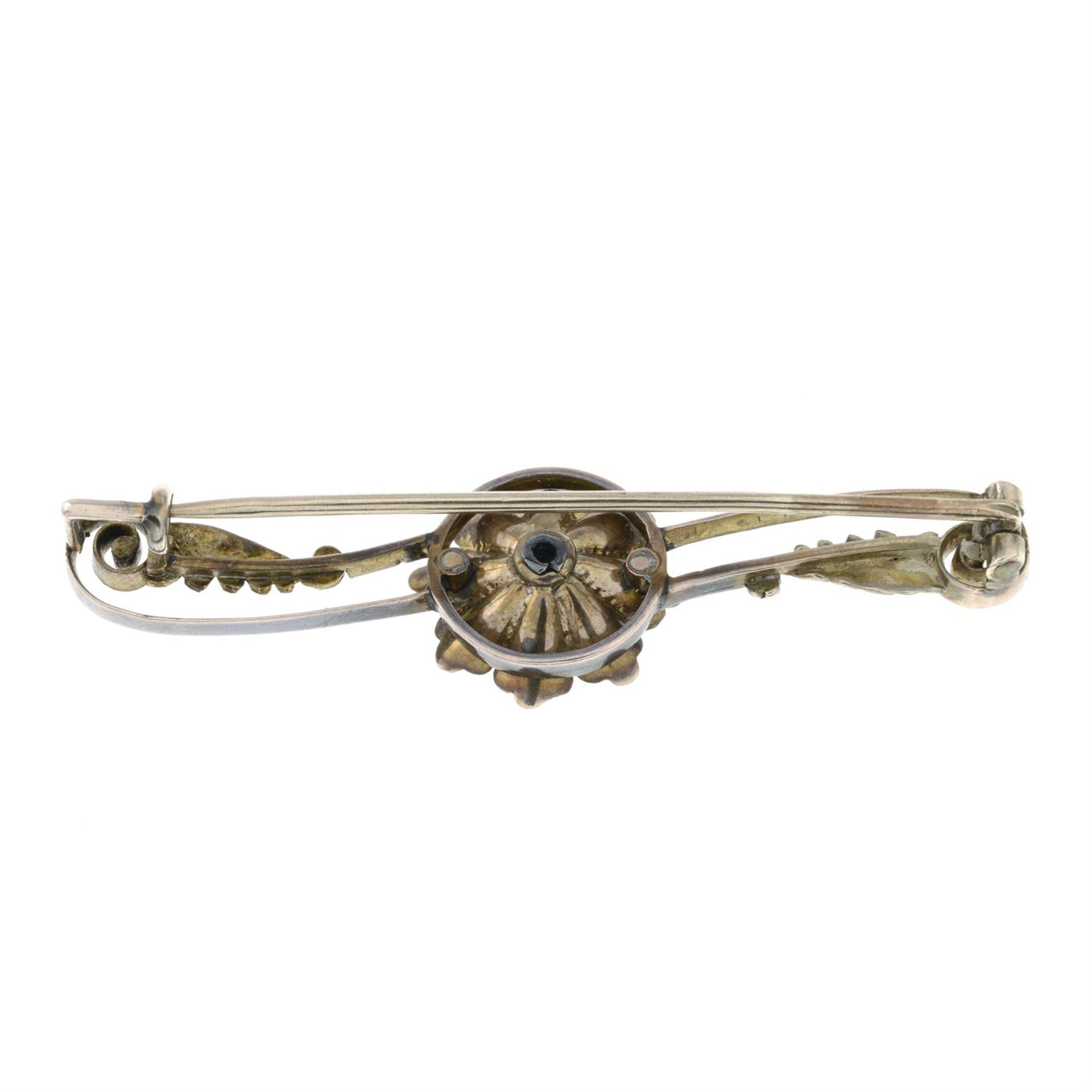 An early 20th century old-cut diamond floral bar brooch. - Image 2 of 2