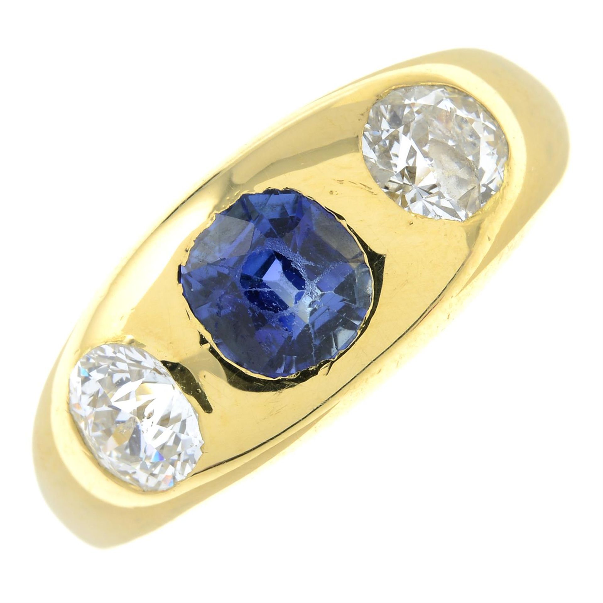 A sapphire and old-cut diamond three-stone ring.