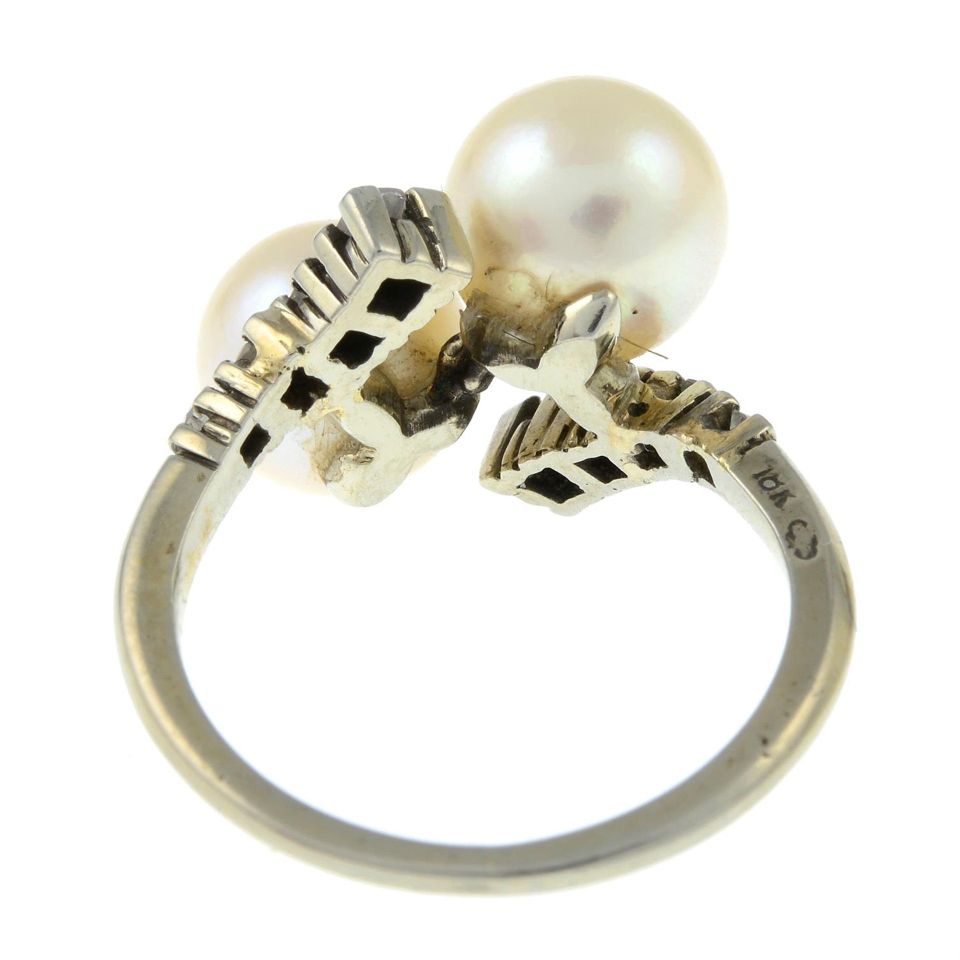 A cultured pearl and diamond crossover ring. - Image 3 of 3