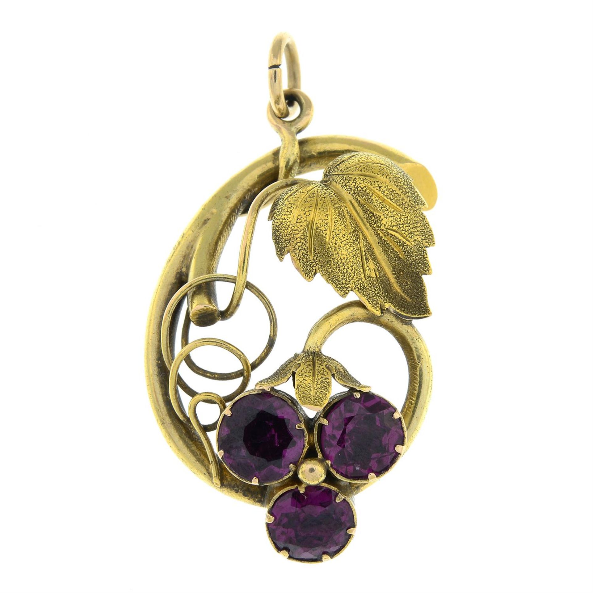 An early 20th century gold garnet pendant.